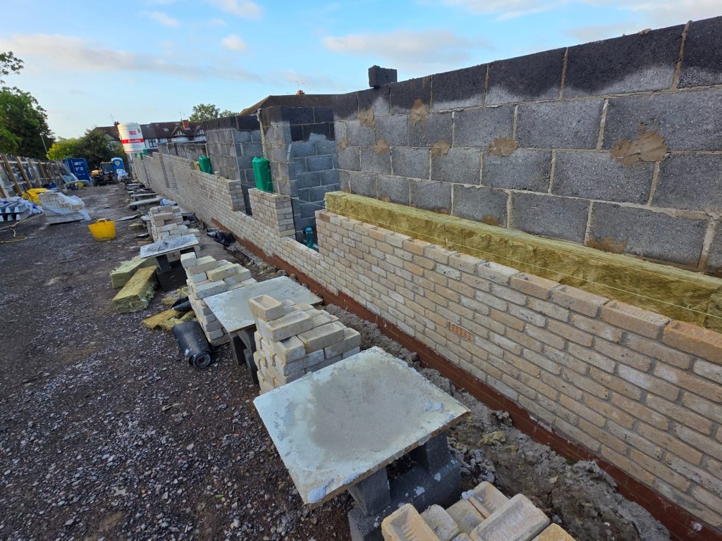 a tall brick building with balconies and balconies