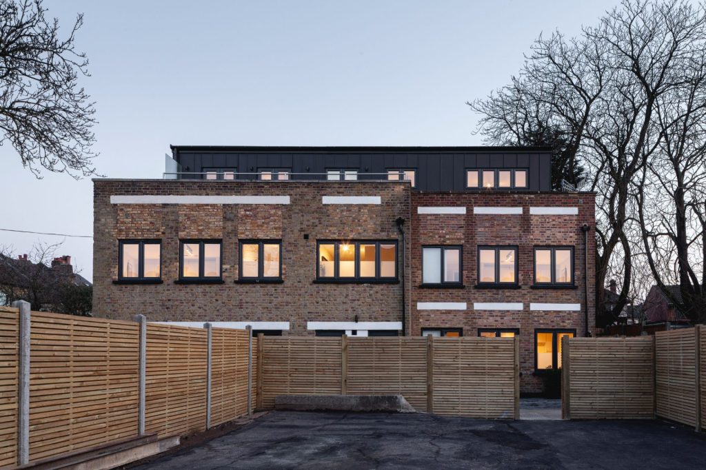 Conversion of a 2-storey commercial workshop building into 7 residential units, delivered from strip-out and structural works through to completion.
