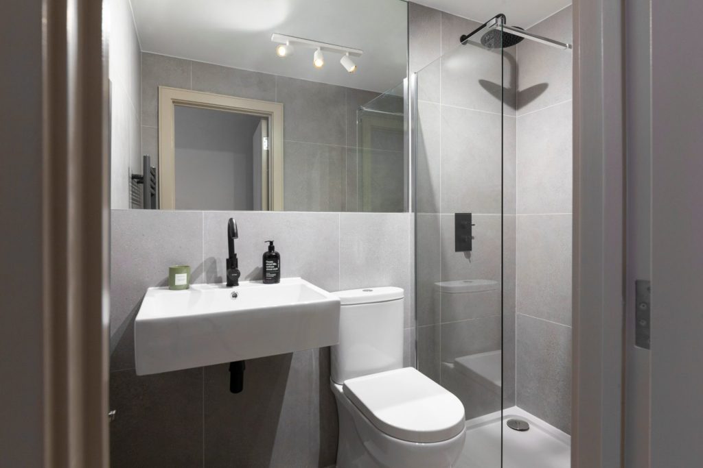 Conversion of a 2-storey commercial workshop building into 7 residential units, delivered from strip-out and structural works through to completion.
