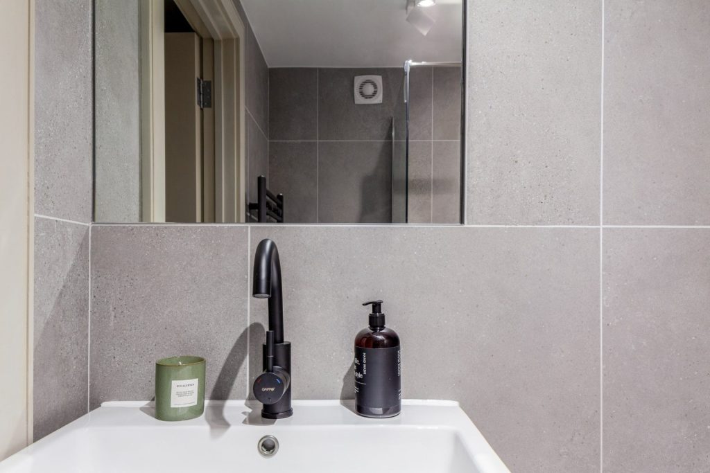 Conversion of a 2-storey commercial workshop building into 7 residential units, delivered from strip-out and structural works through to completion.
