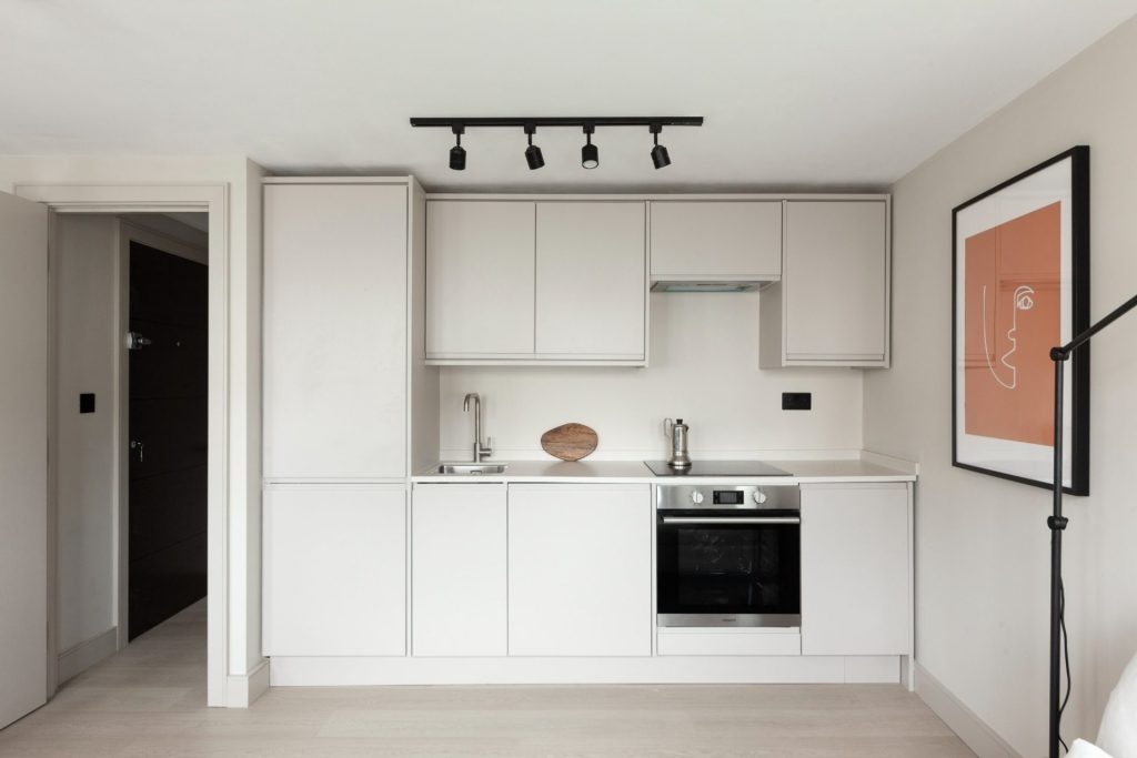 Conversion of a 2-storey commercial workshop building into 7 residential units, delivered from strip-out and structural works through to completion.
