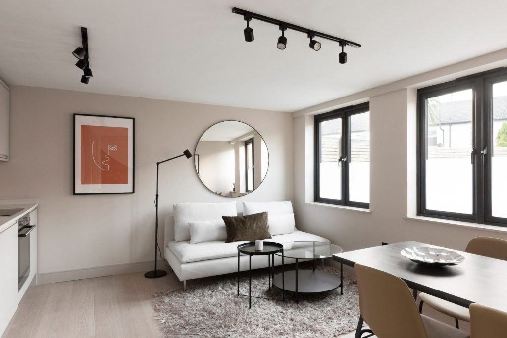 Conversion of a 2-storey commercial workshop building into 7 residential units, delivered from strip-out and structural works through to completion.
