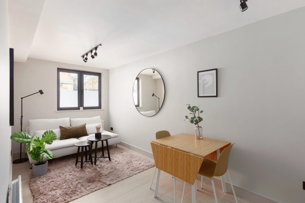 Conversion of a 2-storey commercial workshop building into 7 residential units, delivered from strip-out and structural works through to completion.
