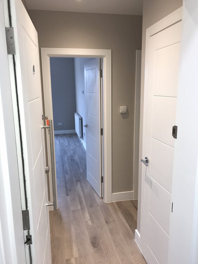 Conversion of existing office space into 7 residential units, including the addition of a new penthouse at roof level.