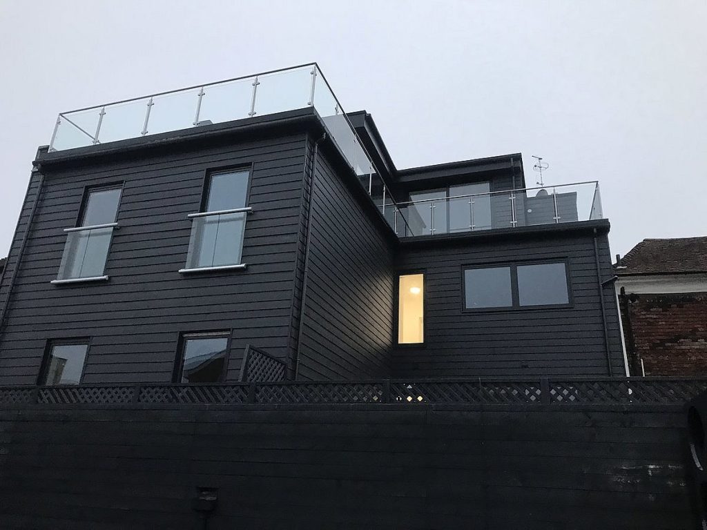 Conversion of existing office space into 7 residential units, including the addition of a new penthouse at roof level.