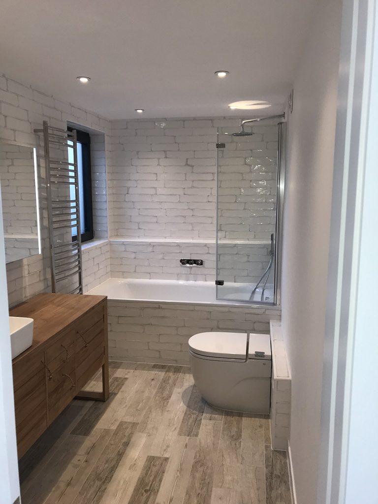 Conversion of existing office space into 7 residential units, including the addition of a new penthouse at roof level.