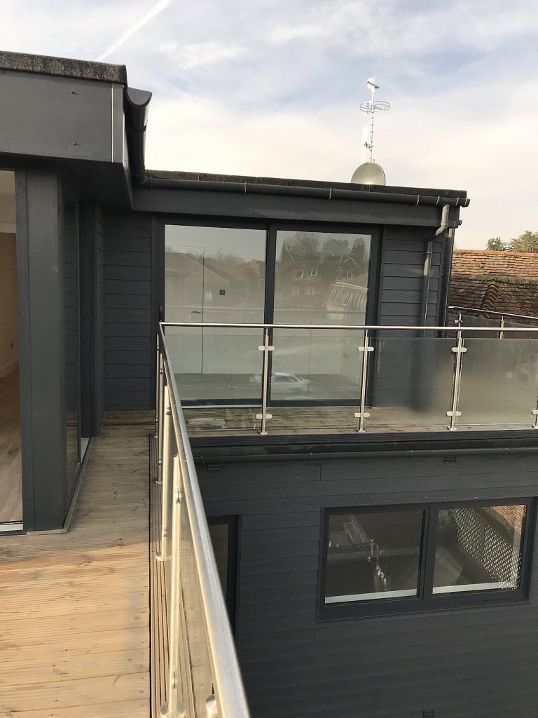 Conversion of existing office space into 7 residential units, including the addition of a new penthouse at roof level.
