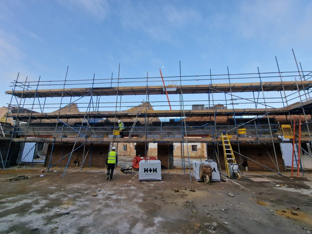 a large building with scaffolding on top of it