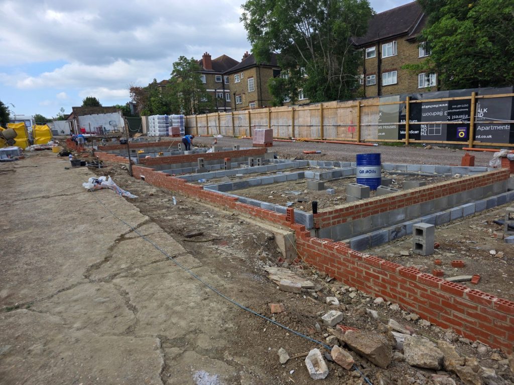 a tall brick building with balconies and balconies