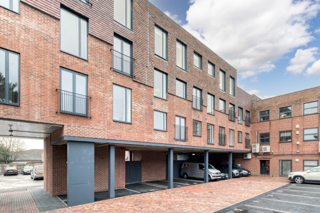 Conversion of a 3-storey office building into 14 residential units, delivered from strip-out and structural alterations through to completion.