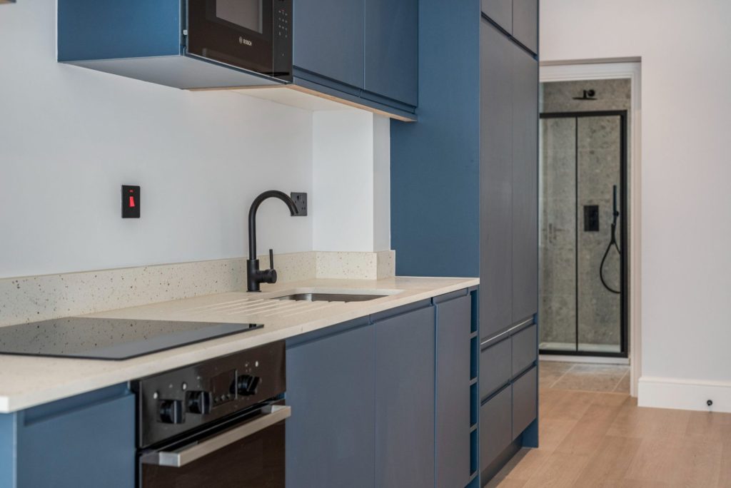 Conversion of a 3-storey office building into 14 residential units on a prominent high street location in Reading, delivered from initial strip-out through to full internal fit-out and finishing works.
